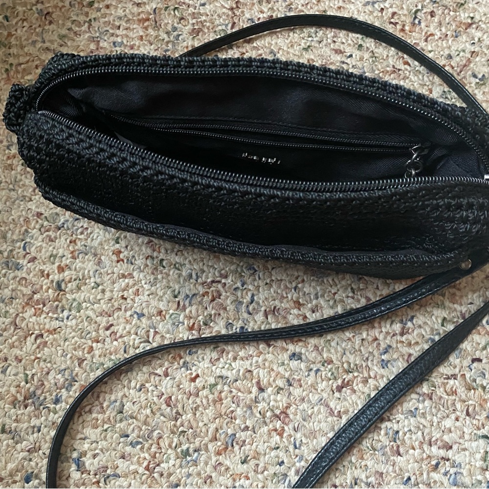 The Sak black crochet camera purse